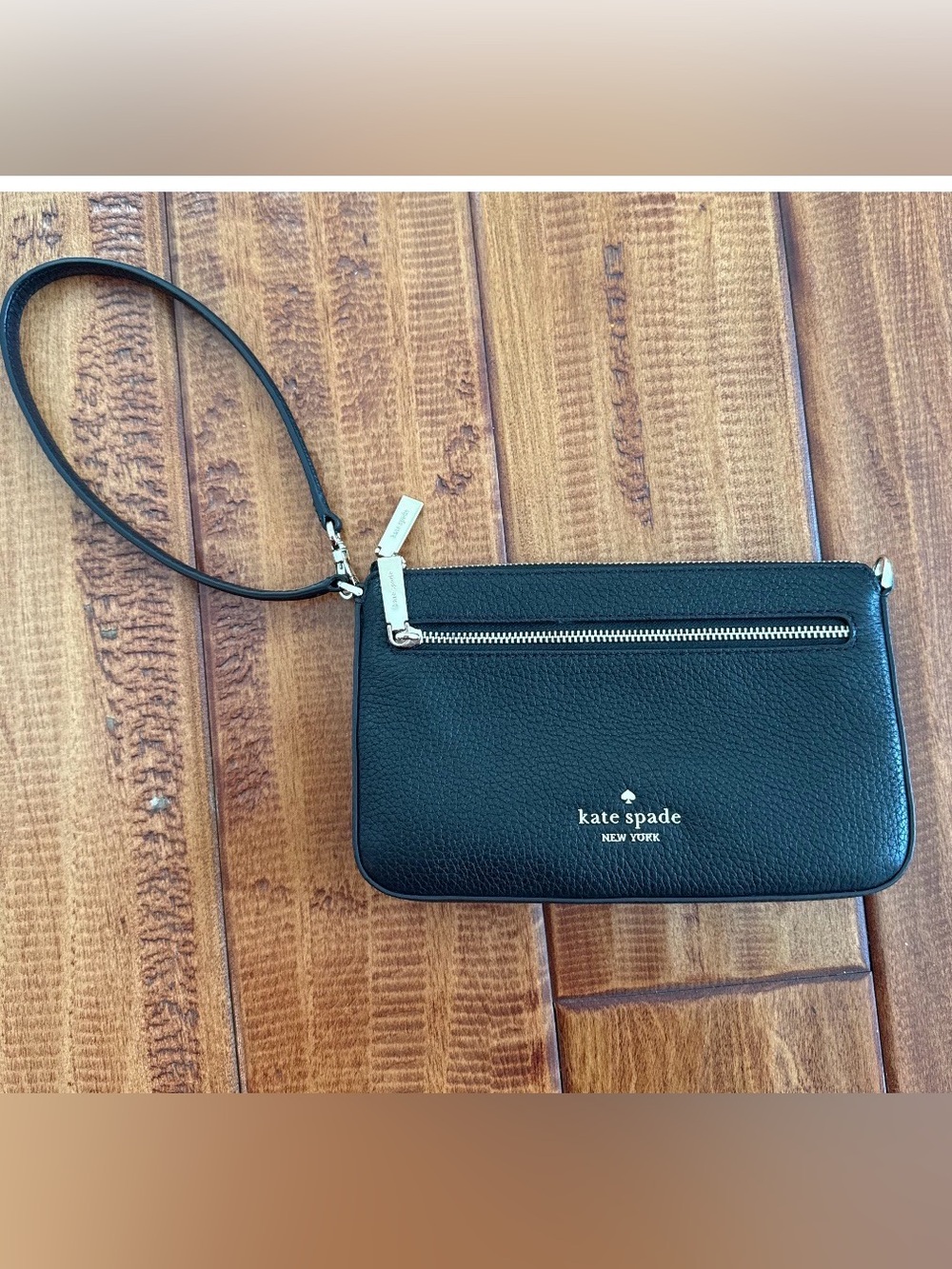 kate spade Pebbled Wristlet in Black. Like new without tags
